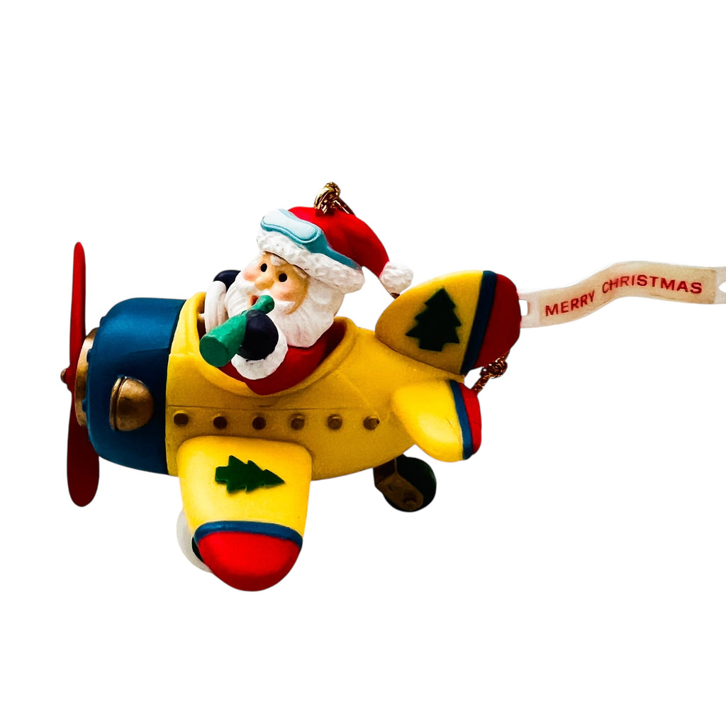 Vintage Traditions Santa Santa in a Airplane Christmas Ornament