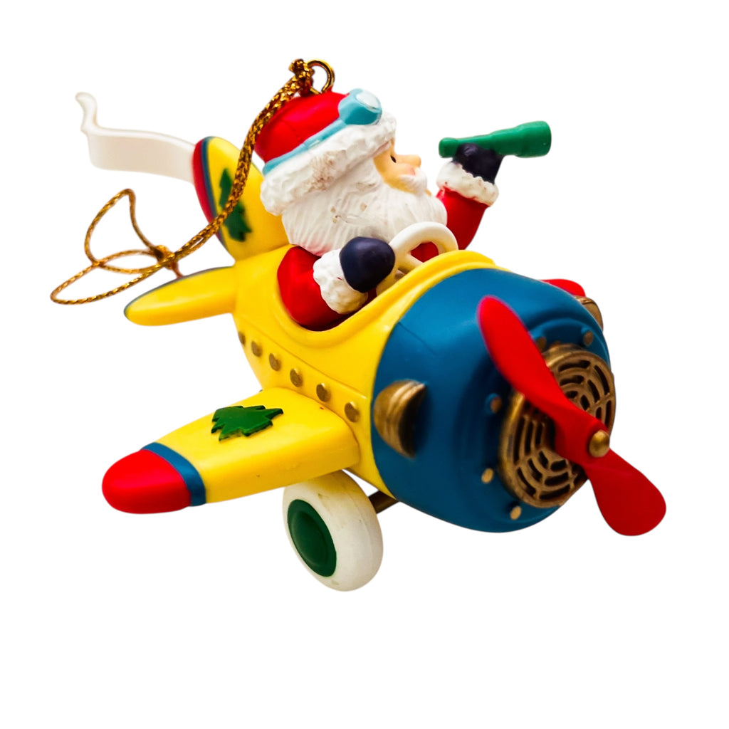 Vintage Traditions Santa Santa in a Airplane Christmas Ornament
