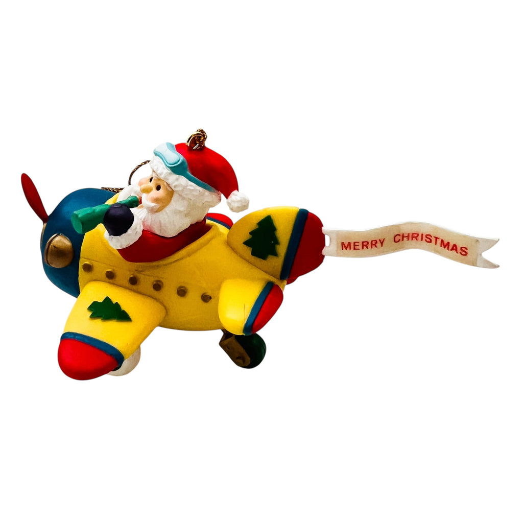 Vintage Traditions Santa Santa in a Airplane Christmas Ornament